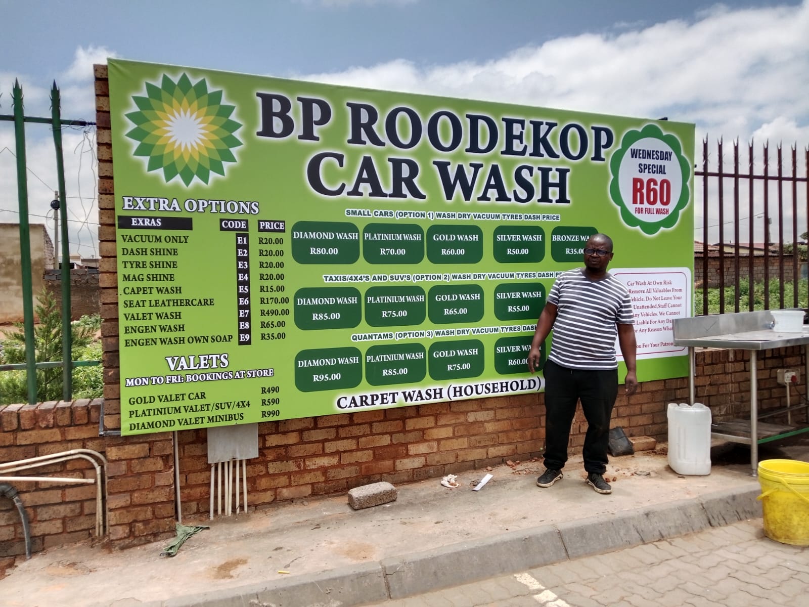 Large PVC banner price board for a car wash