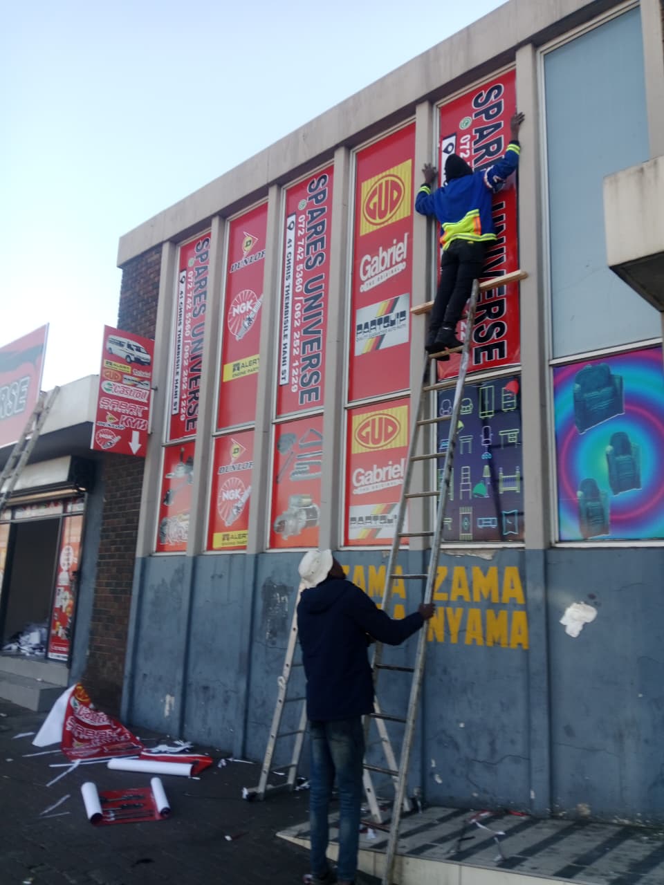 Window wrap advertising installation